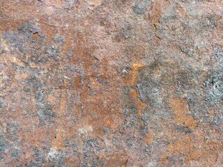 Corroded Rust Texture on Old Metal Surface. Close-up of a rusty, flaking metal surface with oxidized patterns. Ideal for grunge textures, backgrounds, or industrial design