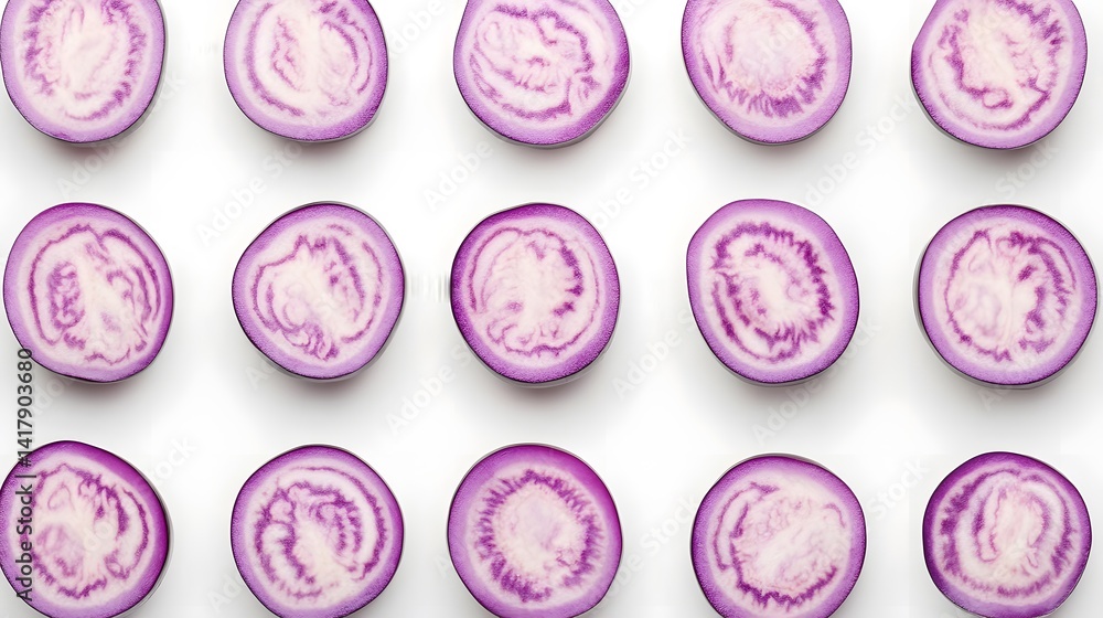 Poster overhead shot of sliced purple eggplants arranged in neat rows against a white background. the vibra