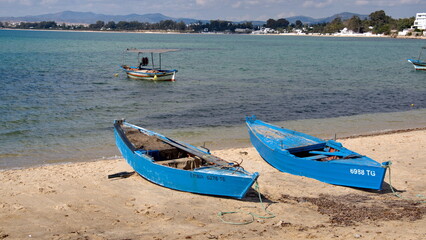 Fototapeta premium Fishing boats on the beach in Hammamet, Tunisia
