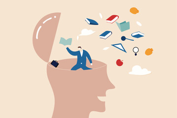 Unlearn, forget wrong information or knowledge, erase or delete memory for free space to learn new things concept, businessman throw away books and knowledge from his brain open head.