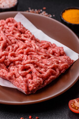 Stuffing or ground raw beef or pork with salt and spices