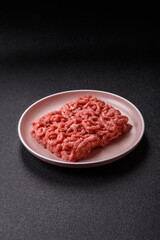 Stuffing or ground raw beef or pork with salt and spices