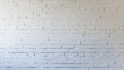Obraz premium Bright white brick wall showing detailed texture and paint strokes, ideal for a minimalistic backdrop