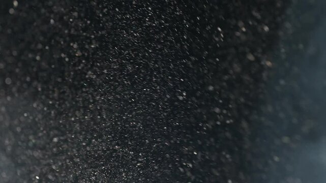 Particles on black background