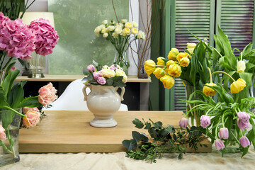 a view of the florist's workplace with a multitude of flowers