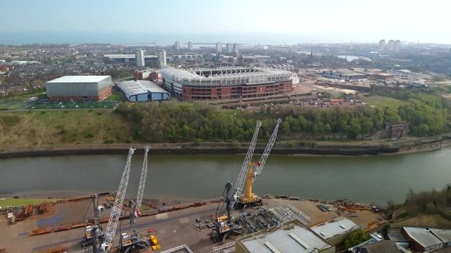 Sunderland UK: 12th April 2025: Sunderland city, industrial area by the River Wear and Roker elevated drone footage 
