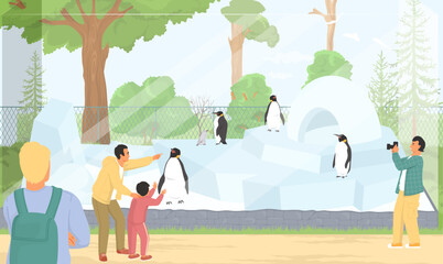 Visitors gather around an icy habitat to witness penguins waddling and swimming. A child eagerly points at the animals while adults take pictures, creating joyful memories.