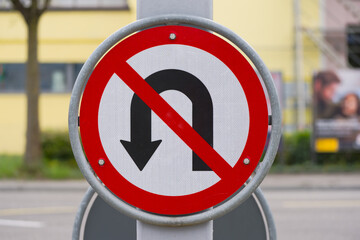 Prohibition sign u-turn forbidden at Swiss City of Z&uuml;rich on a cloudy spring afternoon. Photo taken April 18th, 2025, Zurich Schwamendingen, Switzerland.