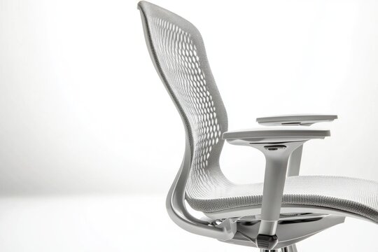 Modern ergonomic office chair with mesh back and adjustable arms, designed for comfort and support.