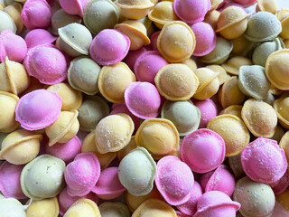 colorful rainbow frozen dumplings, ravioli. food photo