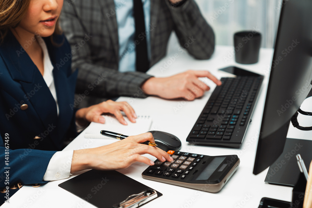 Poster cropped hands businessman with coworker calculating with calculator manual's financial and accountin