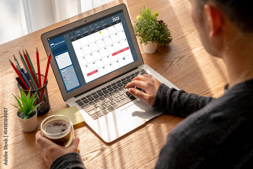 Poster calendar on computer software application for modish schedule planning for personal organizer and on