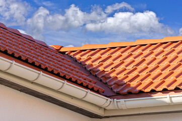 A building with red metal tiles