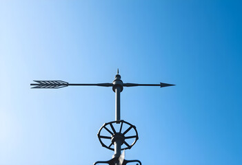 weather vane with an arrow on top of it