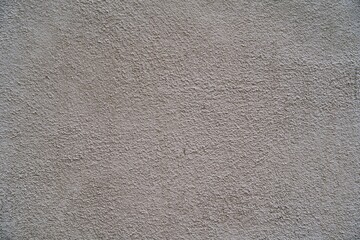 The photograph showcases an abstract wall texture in shades of gray with subtle patterns, offering an elegant and professional appearance. Perfect as a background for presentations, design projects