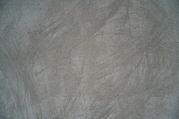 The photograph showcases an abstract wall texture in shades of gray with subtle patterns, offering an elegant and professional appearance. Perfect as a background for presentations, design projects