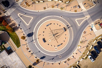 Large round plaza with a clock tower in the center