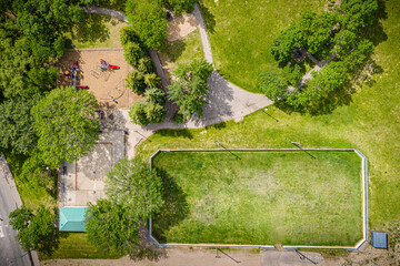 Park with a playground and a field