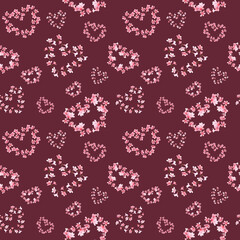 Seamless pattern of hearts with pink sakura flowers