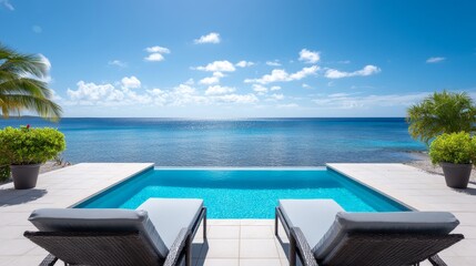 Obraz premium Tranquil Oceanfront Pool Villa - Luxury villa with private infinity pool overlooking a stunning ocean view. Perfect for relaxation and escape
