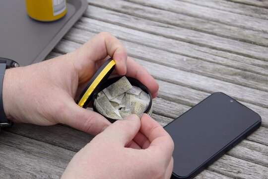 A box of snus pads is a substitute for smokeless cigarettes. Swedish nicotine pouche