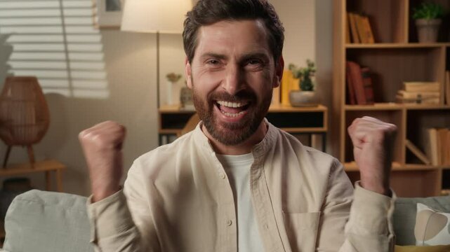 Portrait guy happy male winner champion looking at camera emotions rejoice excited joyful Caucasian man shout scream cheer yes winning success celebrate relocation loan mortgage bank credit relocation