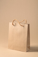 Paper bag on a beige background.