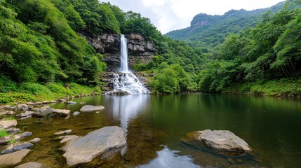 Fototapeta premium Serene waterfall nature scene lush greenery tranquil water eco tourism relaxation
