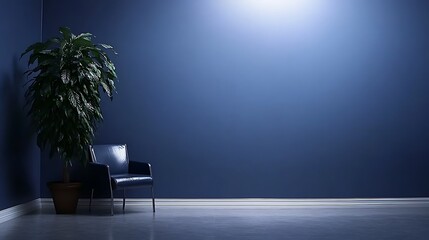 Empty corner room with dark blue walls and a single chair.