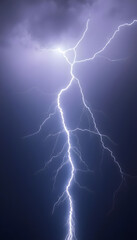 lightning bolt striking across a dark sky