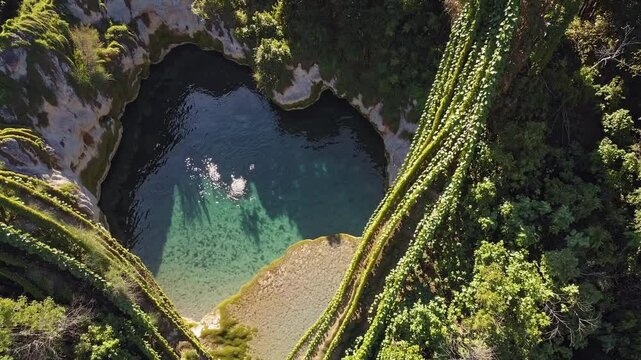 Serenity at Cenote Ik Kil Surrounded by Lush Greenery  