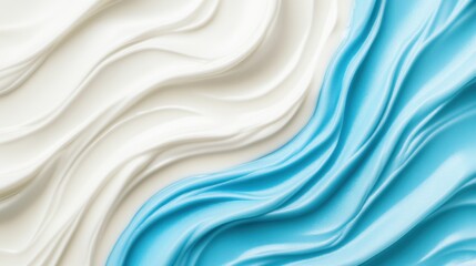 Obraz premium White and light blue creamy texture forming swirling pattern.