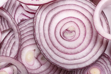 Texture of fresh sliced red onions as background