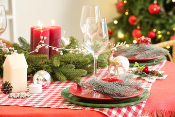 Festive dining table served for Christmas celebration, closeup