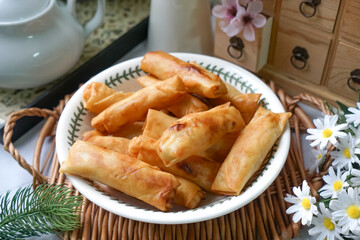 Fried spring rolls or Popiah Goreng, crispy fried spring roll filled with vegetables, meat or prawns, offering a crunchy delight.  Usually served for breakfast or afternoon tea.
