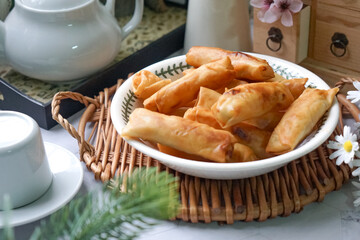 Fried spring rolls or Popiah Goreng, crispy fried spring roll filled with vegetables, meat or...