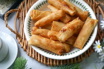 Fried spring rolls or Popiah Goreng, crispy fried spring roll filled with vegetables, meat or...