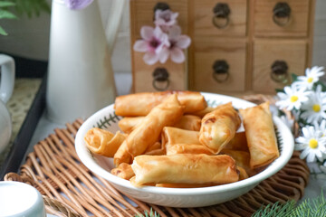 Fried spring rolls or Popiah Goreng, crispy fried spring roll filled with vegetables, meat or...