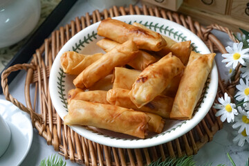 Fried spring rolls or Popiah Goreng, crispy fried spring roll filled with vegetables, meat or prawns, offering a crunchy delight.  Usually served for breakfast or afternoon tea.