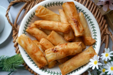 Fried spring rolls or Popiah Goreng, crispy fried spring roll filled with vegetables, meat or prawns, offering a crunchy delight.  Usually served for breakfast or afternoon tea.