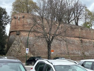 Wall of medieval fortress (Fortezza Medicea) in Siena, Italy.