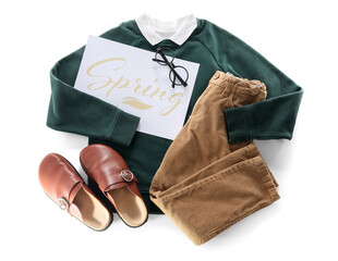 Naklejka premium Card with word SPRING, stylish children's clothes, eyeglasses and shoes on white background