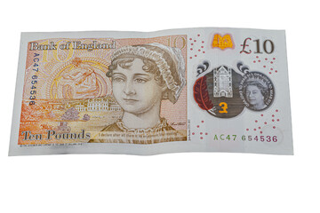 Reverse side of a ten pounds polymer banknote from the Bank of England, showcasing author Jane Austen’s portrait, Winchester Cathedral, a hologram, a quill illustration, and raised printed quotes.
