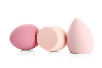 Makeup sponges on white background