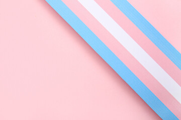 Paper flag of transgender on pink background