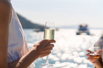 Happy Caucasian man and woman travel nature the sea on luxury catamaran boat yacht on summer beach...