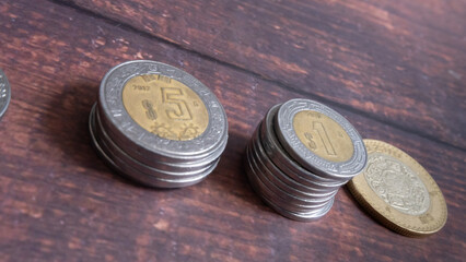 Various coins of 5, 10 and 1 Mexican peso