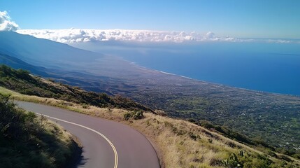 Coastal Highway Winding Through Mountain Landscape Towards Ocean