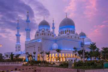 Sheikh Zayed grand mosque at the morning with blue and yellow lights, in solo city