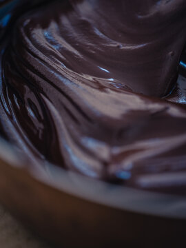 Chocolate icing mixture in bowl